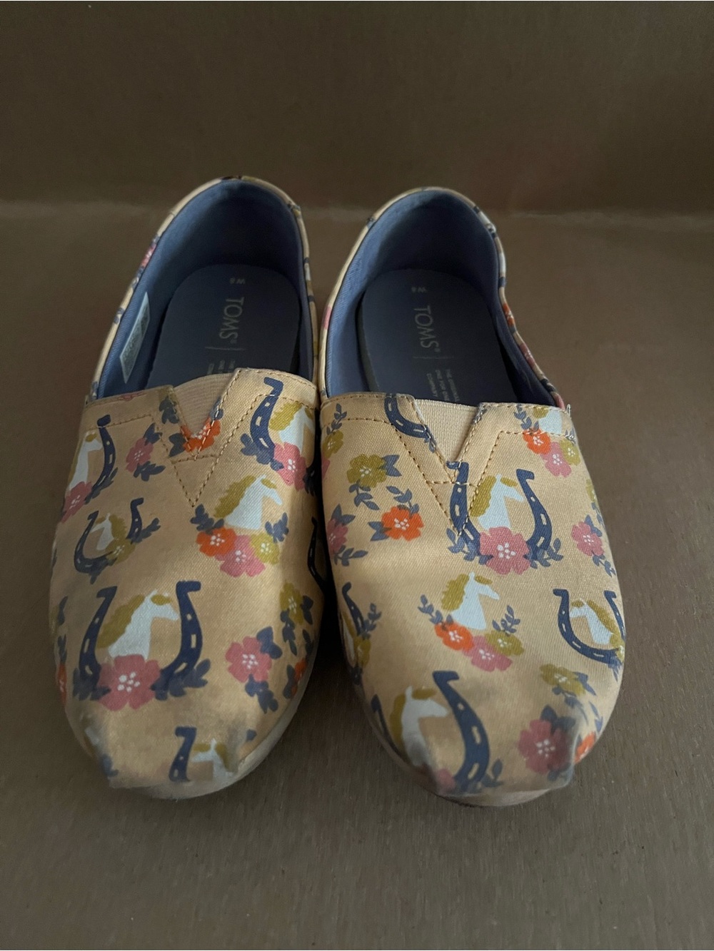 TOMS Tan Floral & Horse Slip-Ons